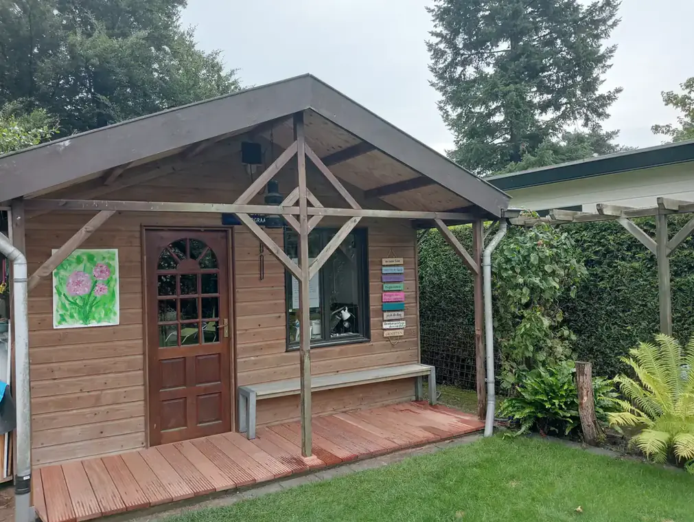 Hardwood decking around a log cabin, photo 3